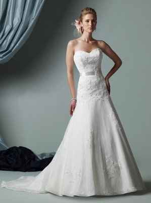 Whose your dress designer?