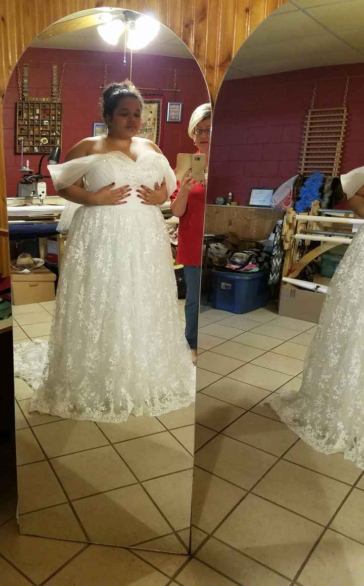 Plus sized princess gown fitting.