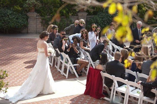 Is it ever ok for a bride to walk down the aisle by herself?