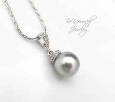 I need help deciding on jewelry! Would you do pearls or bling? (pic included)