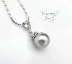 I need help deciding on jewelry! Would you do pearls or bling? (pic included)