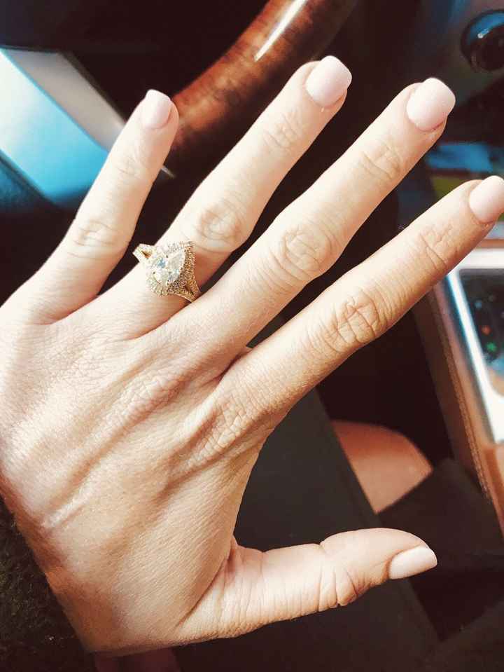 He spent a year designing my ring, down to the scrolls that support my main diamond, "S" and "M" for