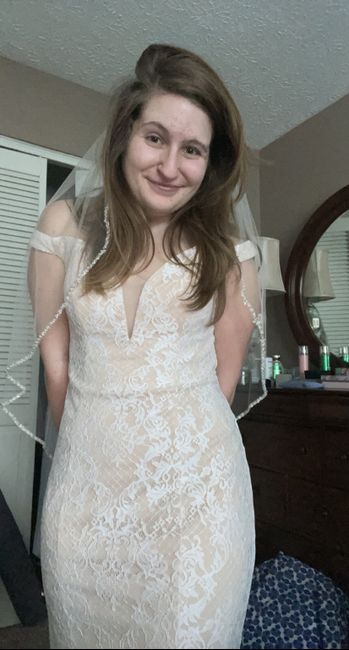 Insecure about my wedding dress because it isn’t completely white and is revealing at the top 1