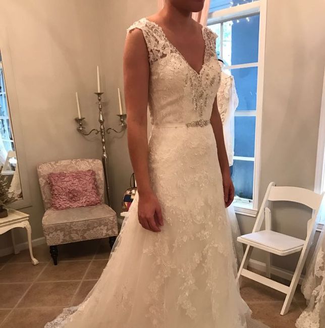 How much was your wedding dress? 4