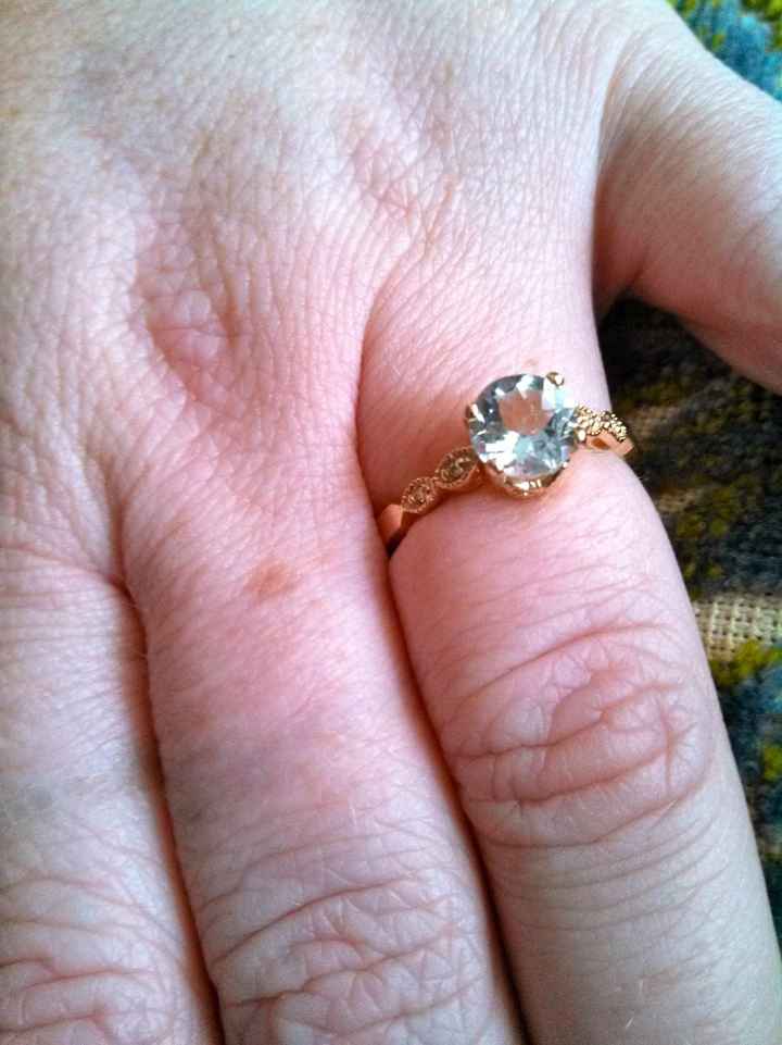 yay!!! my ring is back (art-sy pic) show me yours