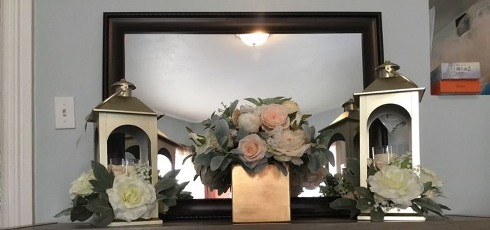 Lanterns and arrangement for alter during ceremony. 
