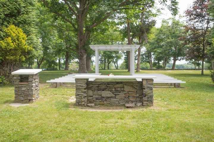 View of the chaper from the podium and back of alter.