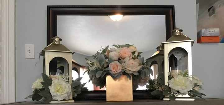 Lanterns and arrangement for alter during ceremony. 
