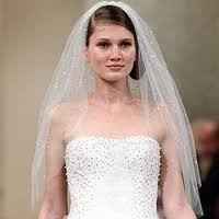 Side bun with a veil?