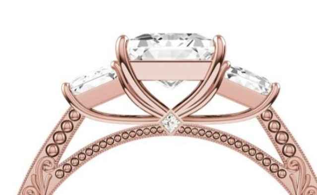 Here is a photo of one with a peekaboo diamond 