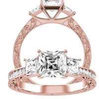 Here is a photo of one with a tapered band and 3 stones 