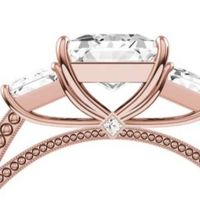 Here is a photo of one with a peekaboo diamond 