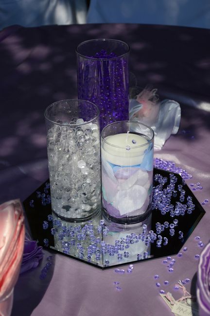 DIY Cylinder tea light holders for wedding centerpieces.