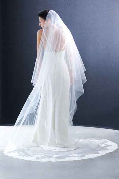 A beautiful Cathedral Veil(9ft) with a blusher.  What kind of fabric does Erica Koesler uses for its