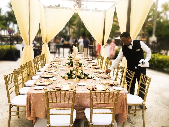 We had a gazebo over the table with 3 chandeliers hanging above. (I apologize if its a little blurry