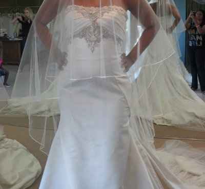 Torn between the too.................Kenneth Pool bride..............