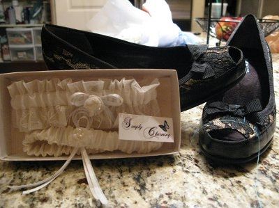 Pics!!!! I've got shoes, got the gown, garter, and the centerpieces!