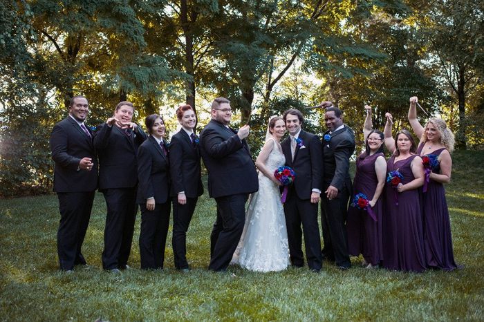 The full party. (Yes, the bridespeople have wands!)