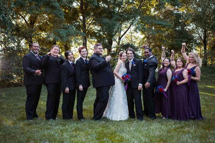 The full party. (Yes, the bridespeople have wands!)