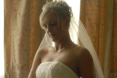 Body position, a little light and the right camera angle are all that is needed to capture the classic beauty of woman about to be married.
