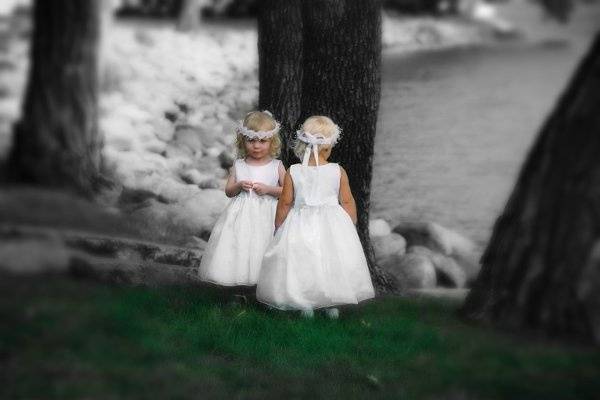Bride's daughter and groom's daughter. One cooperated, one would not, but the picture turned out great!