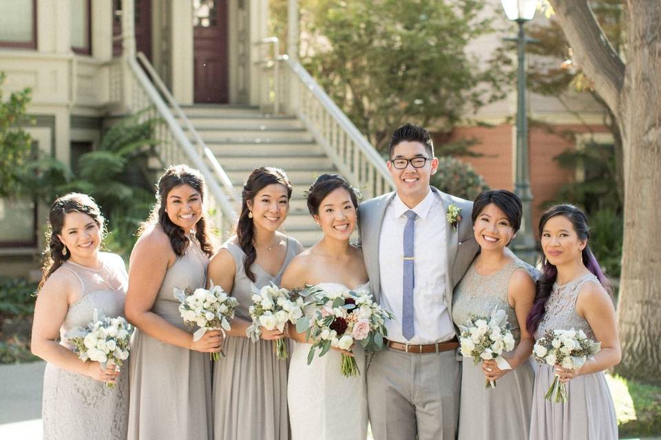 Newlyweds with the bridesmaids