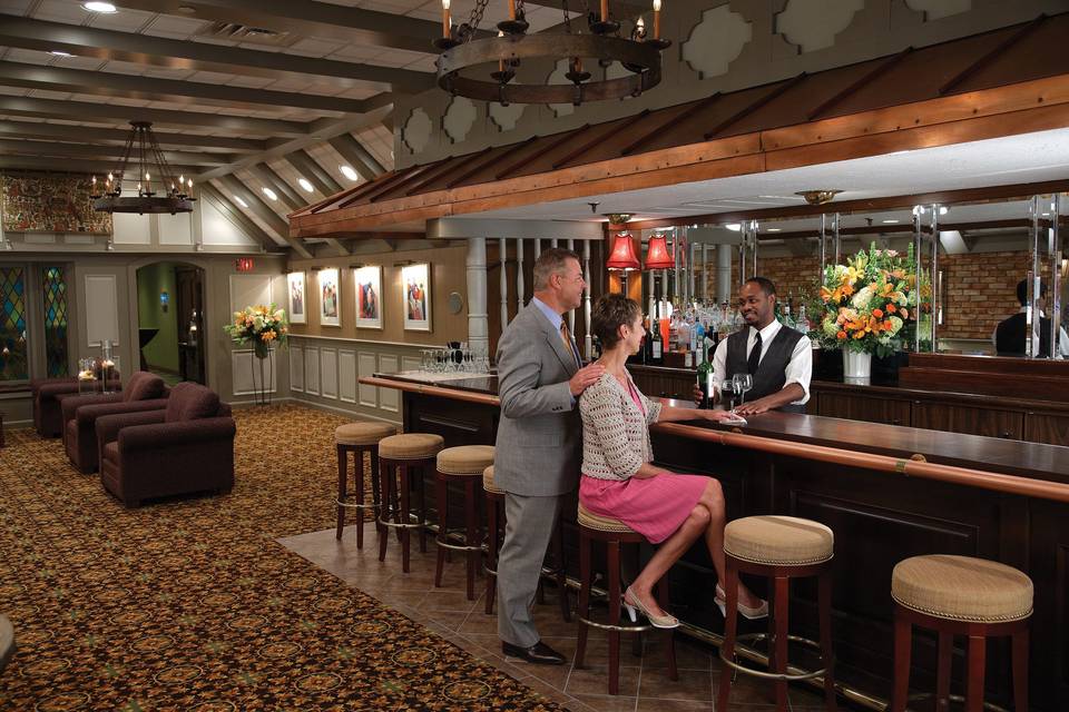 Our parlor is a welcoming and warm space that is sure to make your guests feel right at home. The private premium bar is located in this reception area.