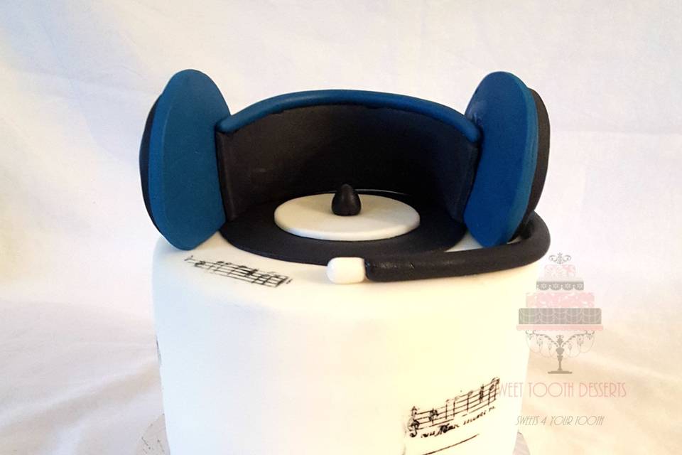 6in DJ Groom's Cake.  Cake vanilla with Swiss Meringue Buttercream, and fondant DJ headphones.