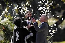 Beautiful wedding with rose petal toss. LGBT wedding celebration. Flyboy Naturals Rose Petals are a wonderful Eco-friendly option!