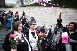 The Happy Couple with the Wedding Petal Toss!  LGBT wedding celebration! Flyboy Naturals Rose Petals