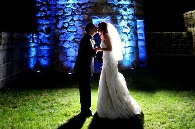 Kiss by the blue lit tower