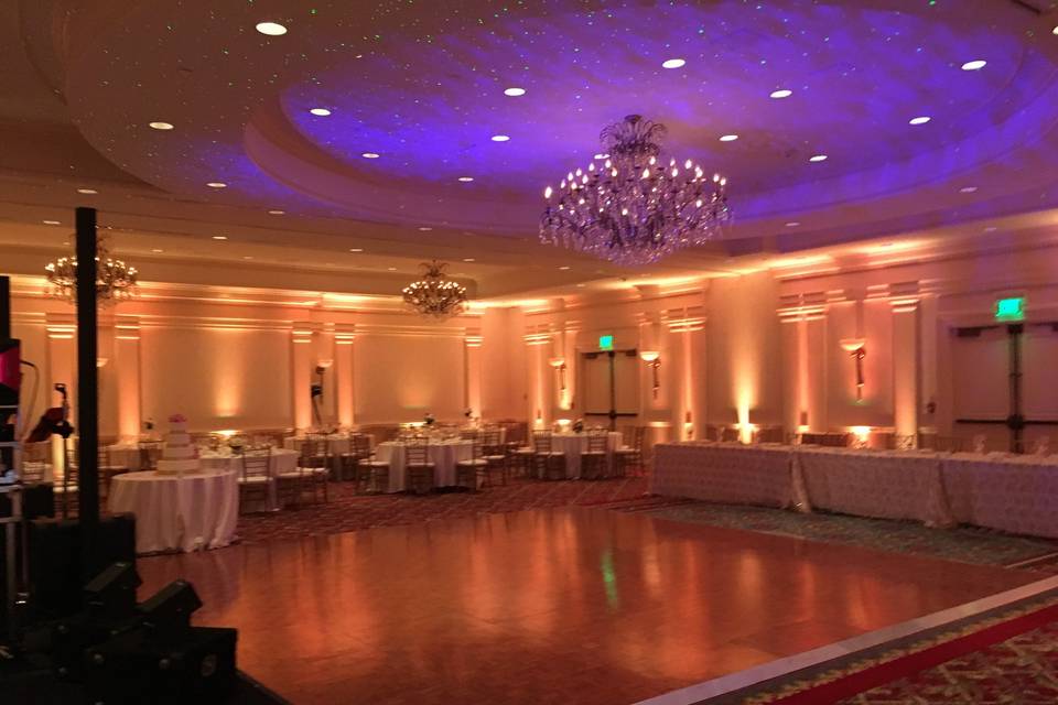 Soft uplighting in sophisticated reception hall