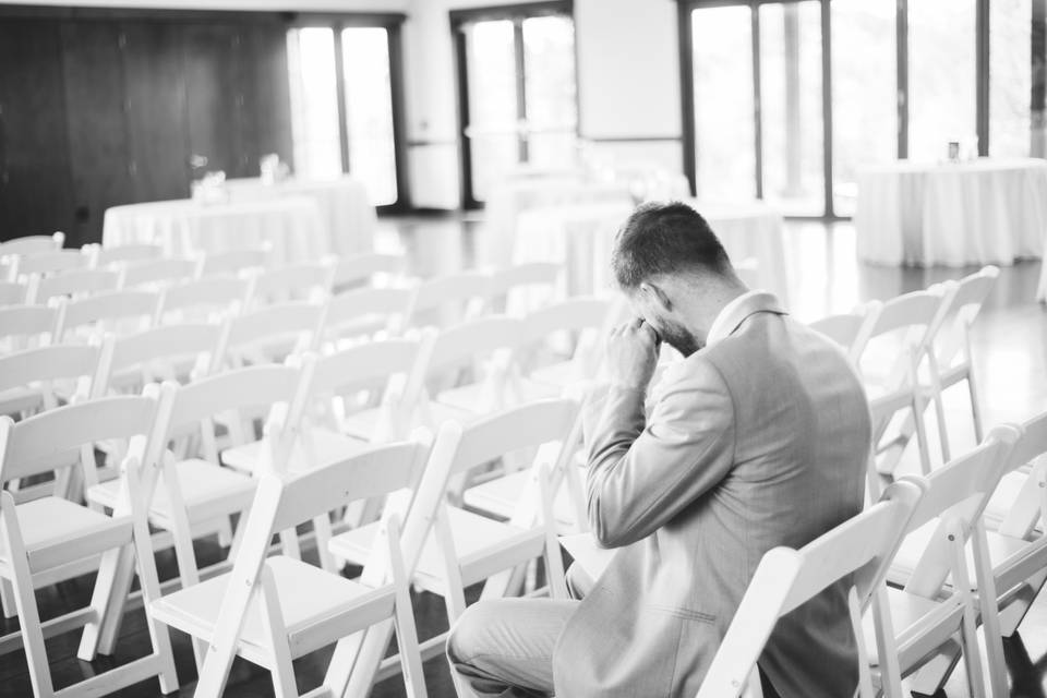 Groom reading note from bride