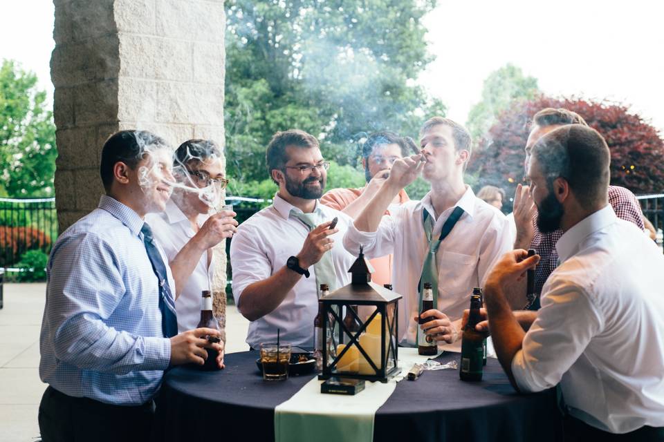 Groomsmen with cigars