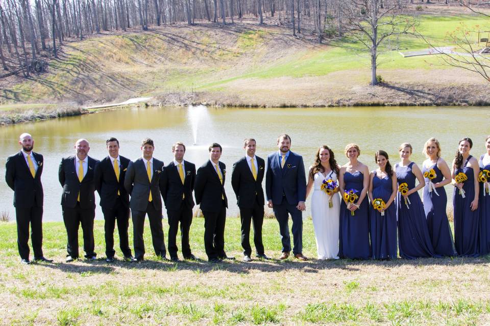 Newlyweds, bridesmaids, and groomsmen