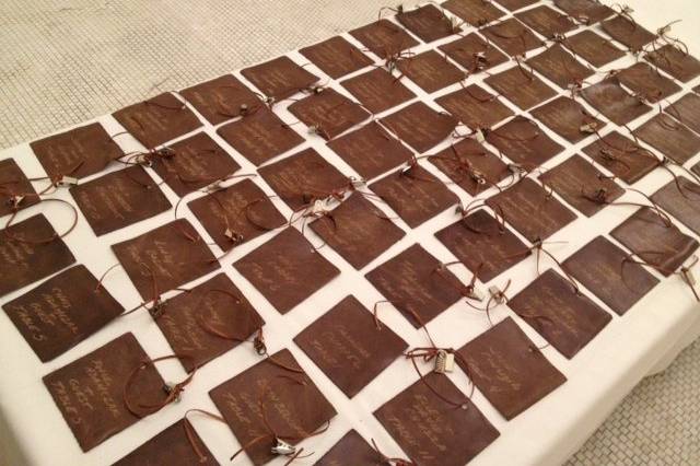What an awesome idea our couple had—custom, leather place cards!  Part of our 