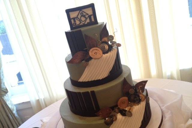 A menswear inspired cake by our preferred vendor, Dessert Deli of Amherst New york.  Michael's concern: 