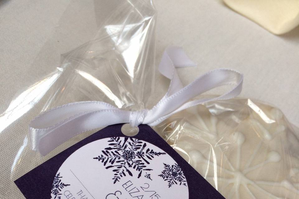 These favor tags were custom designed and used to close the bag around a snowflake cookie.