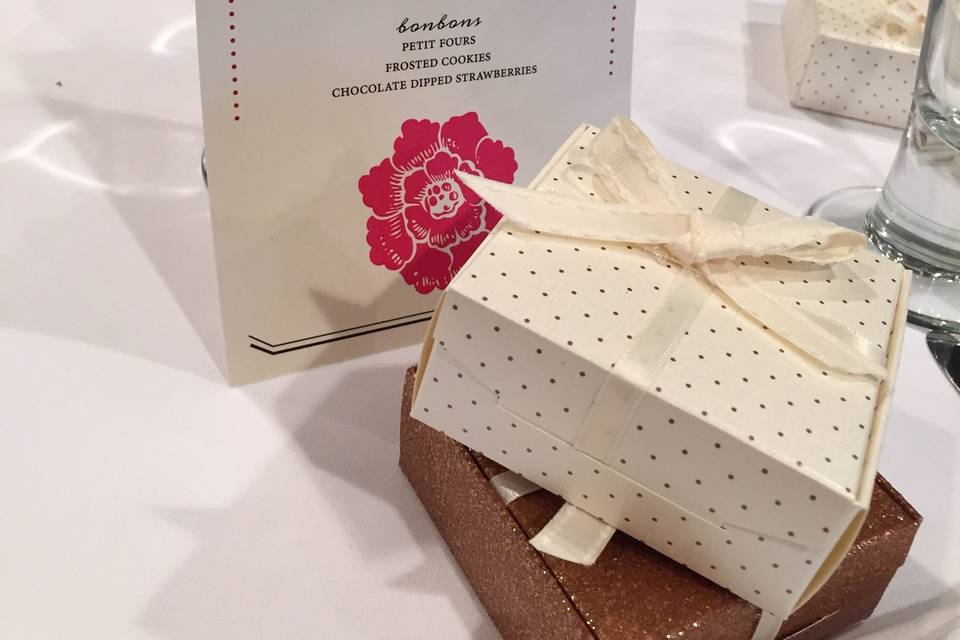 Customer menu cards and soap favors welcome Arianna's guests.
