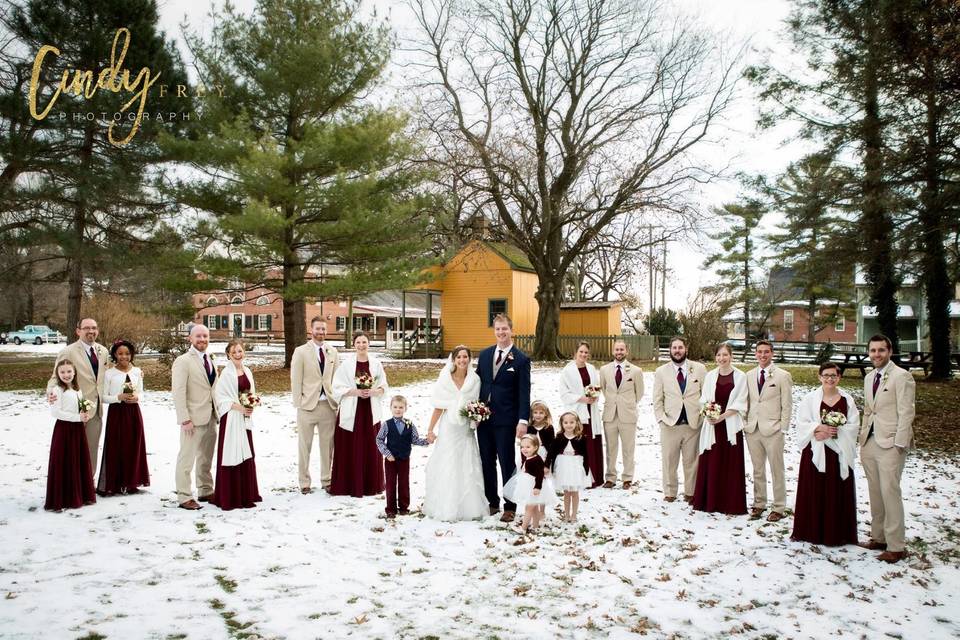 The couple with the bridesmaids and groomsmen