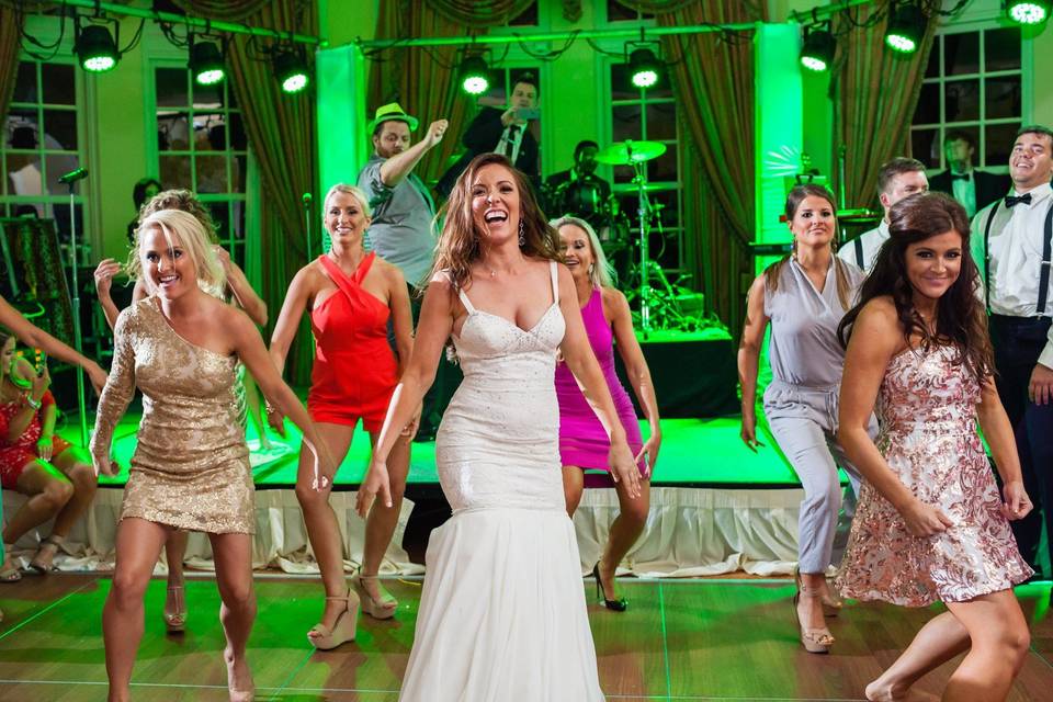 The bride dancing with her guests