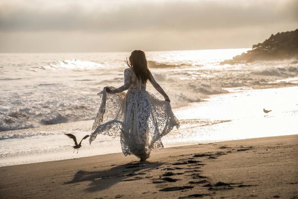 Cinematic bride on beach