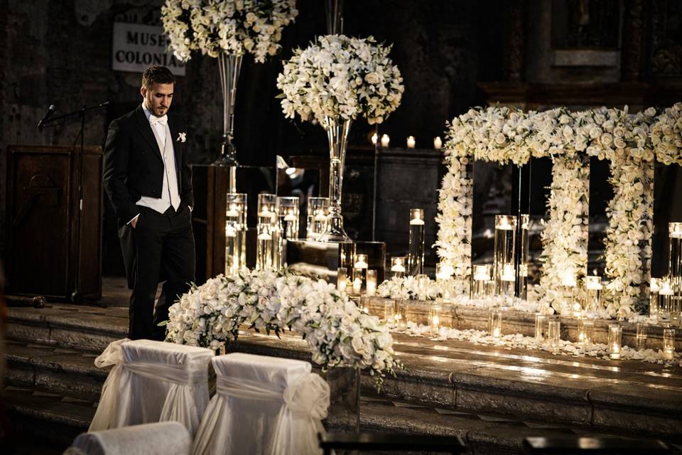Groom at alter