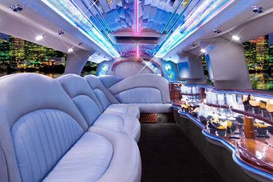 Interior of Hummer Icon limousine.  Seats 14 passengers with luxurious leather seating, hi tech lighting systems and surround sound with sub woofers and amp.