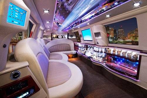 Interior of Ford Excursion limo.  Comfortably seats 14 passengers with leather seating. http://www.viplimo.net/ford-excursion-limo/