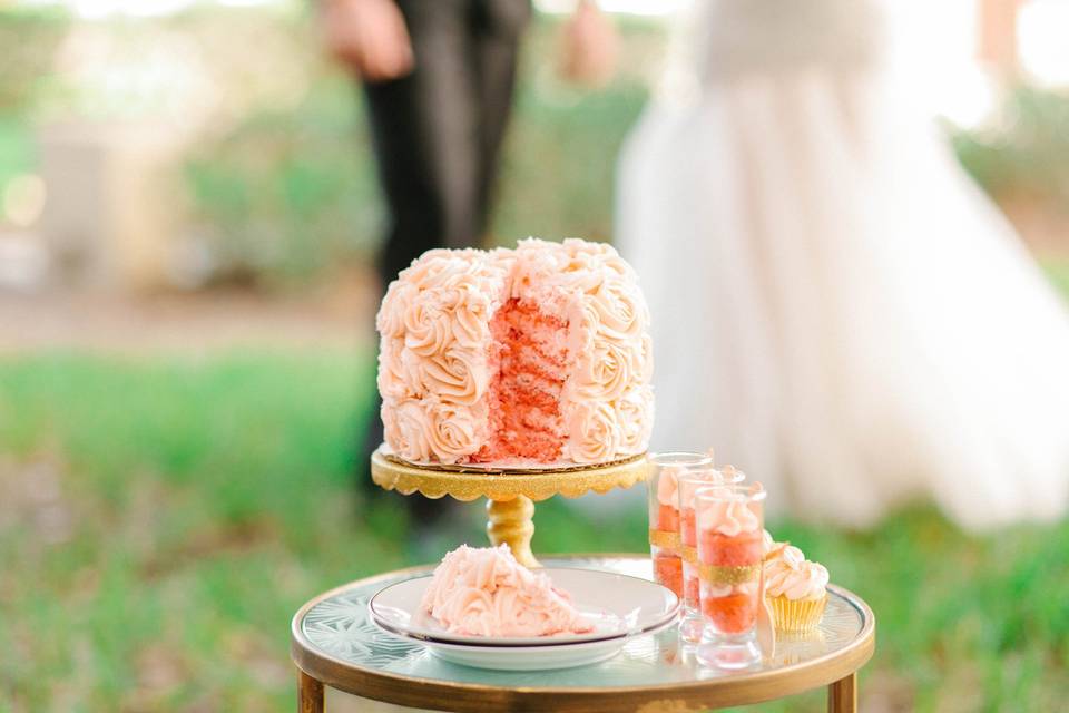 Wedding cake with rose frosting gluten free and vegan 3 layer custom cake.