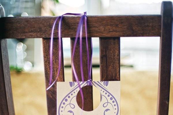 created for the An Affair to Remember showcase at the I Do Downtown Bridal Crawl, Stationery designed by The 2u Collection, LLC, studio photography by Liga PhotographyProgram- hangs from back of chair