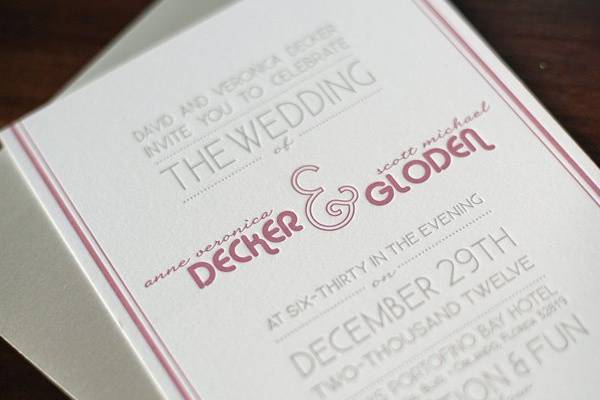 Super thick 130# felt paper with 2 color letterpress bound together with a white satin ribbon and silver flat charms with their initials punched into them. We developed a monogram for the bride and groom, that you will see throughout the whole event! 2ucollection.com