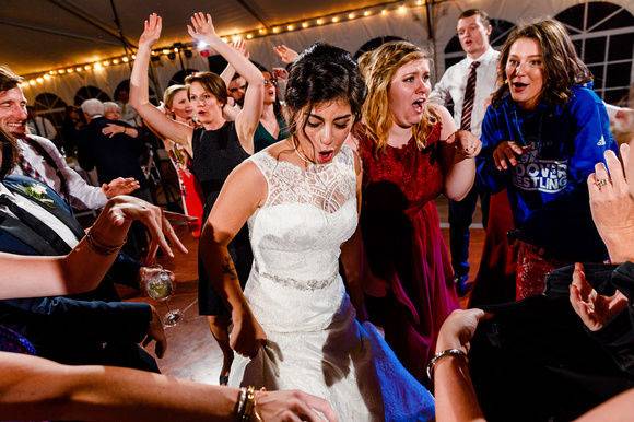 Partying bride and bridesmaid