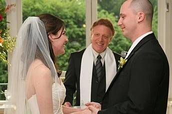 Couple with the officiant